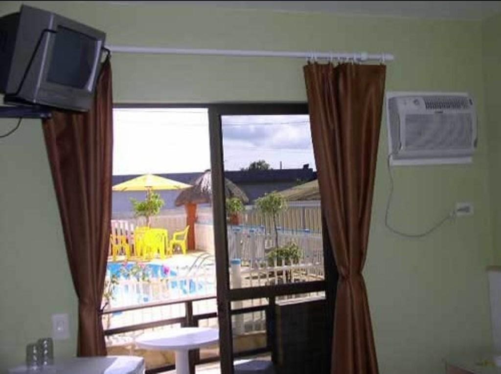 Hotel Pousada Mineirinho Balneário Praia do Leste Quarto foto